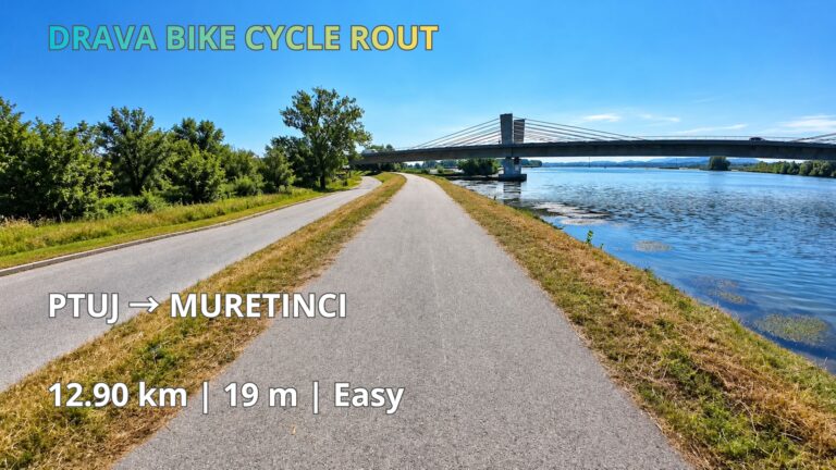 Ptuj 🇸🇮 → Muretinci 🇸🇮 | Drava Bike Cycle Route Cycling path along the Drava River near Ptuj, Slovenia, with a modern bridge in the background on the Drava Bike Cycle Route.